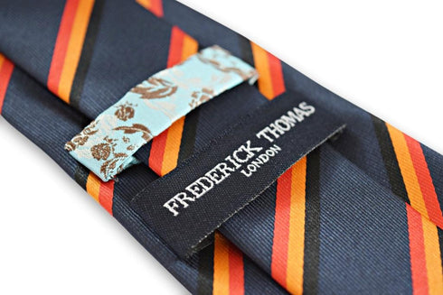 navy tie with red, black and orange stripe design